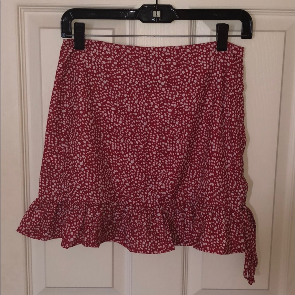 Red and white spotted mini skirt with tie